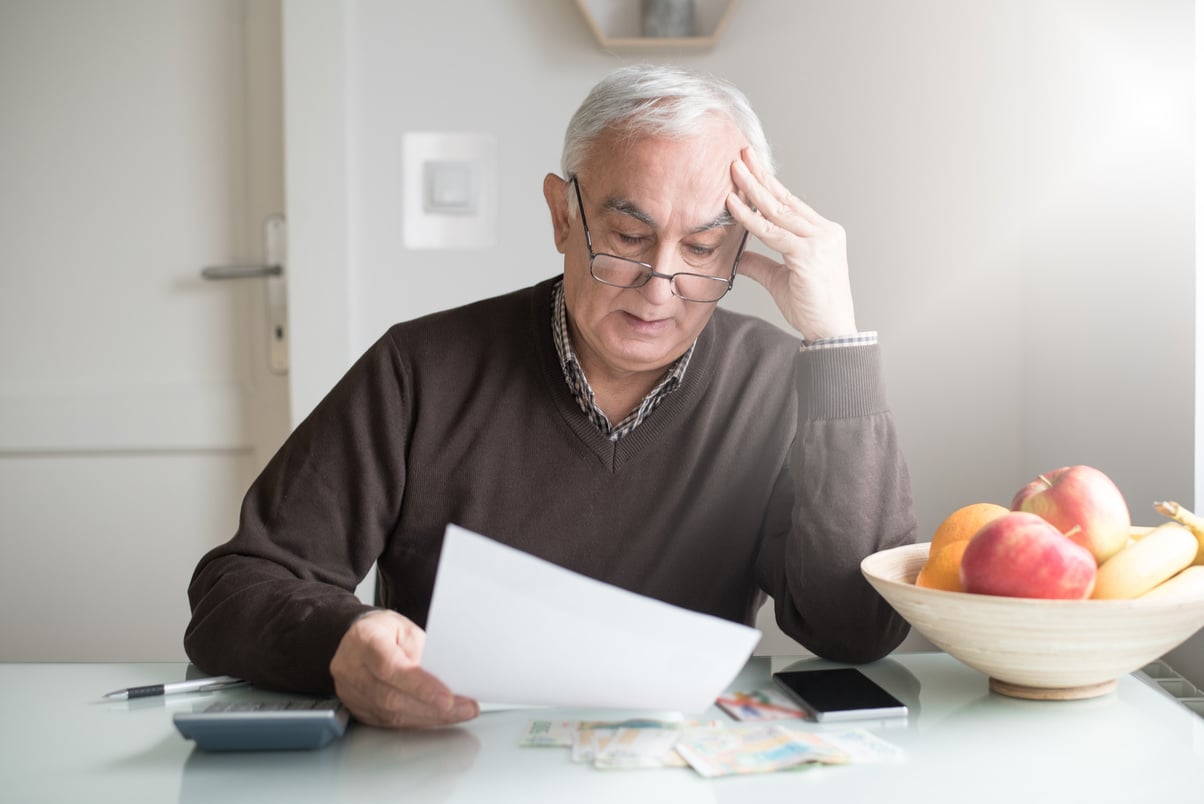 Worried man reading